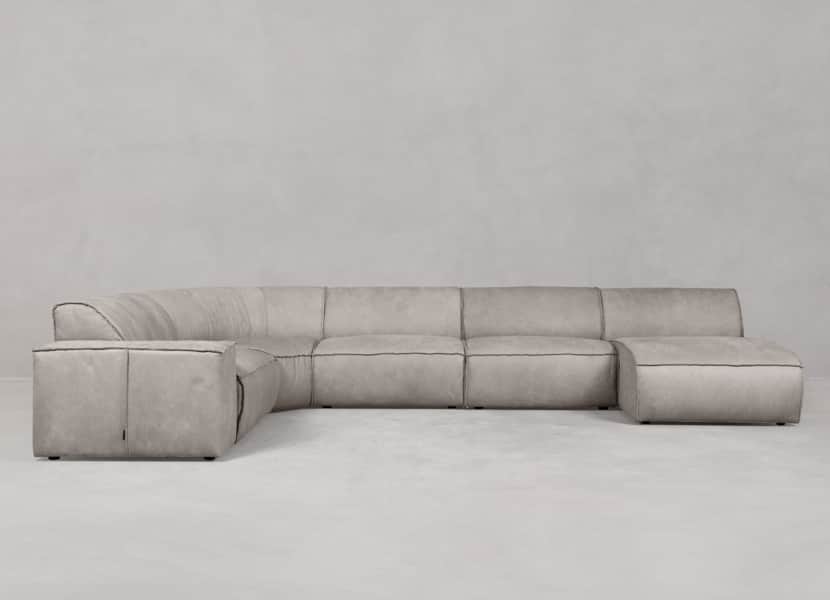 A contemporary modular sectional sofa featuring an L-shaped configuration with a curved corner unit… — 3D model
