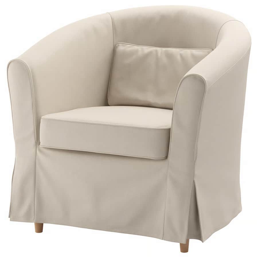 A light-colored armchair with a rounded back and arms, upholstered in fabric. It features a seat cus… — 3D model
