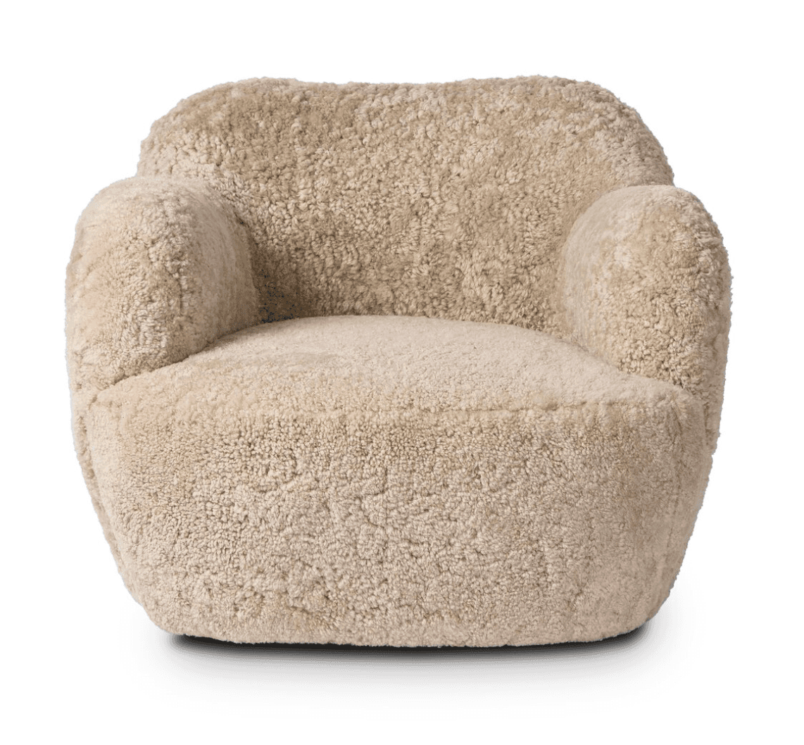 A plush armchair upholstered in a textured, curly, light beige material resembling sheepskin. The ch… — free BLEND 3D model