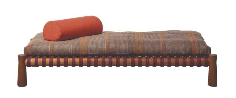 A rustic daybed featuring a solid wooden frame, a support structure made of intricately woven textil… — 3D model
