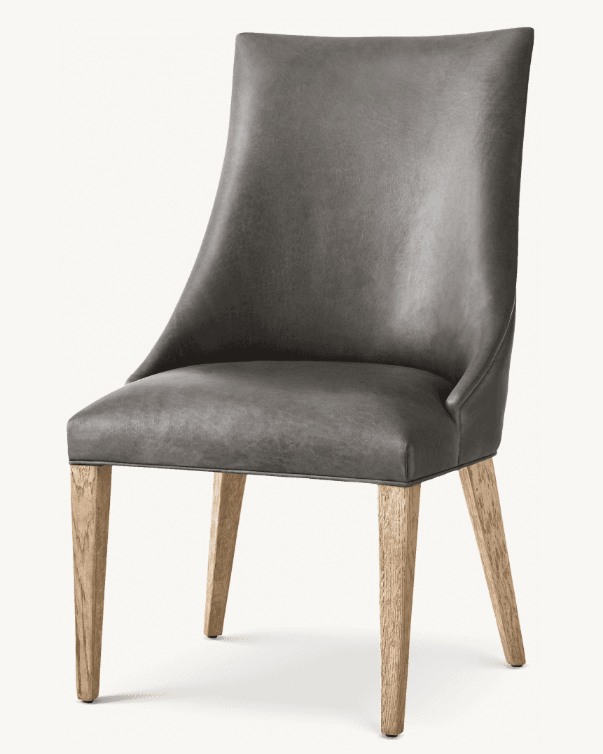 An armless upholstered dining chair featuring a modern transitional design. The seat and backrest ar… — 3D model