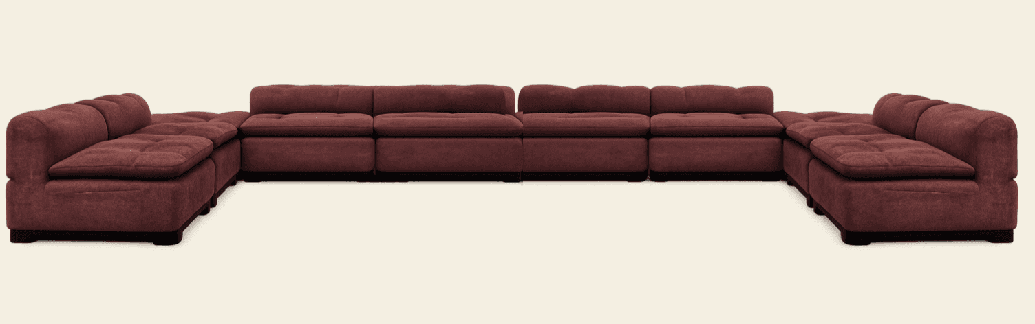 A large, modular sectional sofa arranged in an L-shape, upholstered in a reddish-brown, plush fabric… — 3D model