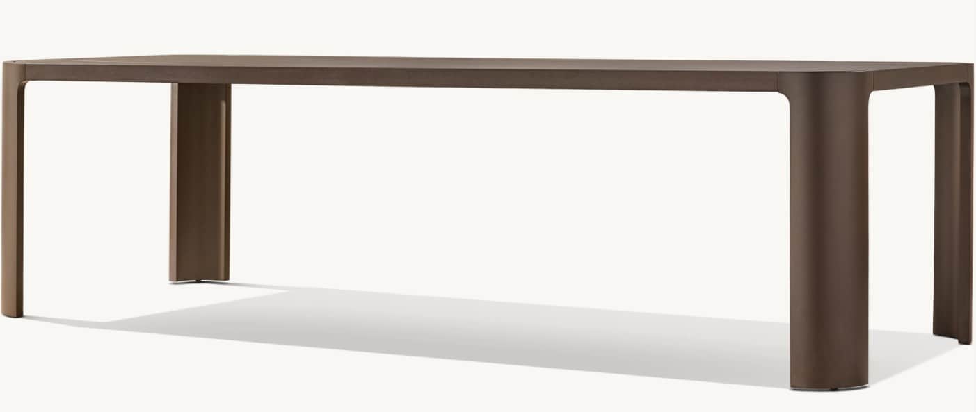A modern dining table with a rectangular top and four cylindrical legs that are integrated into the… — free BLEND 3D model