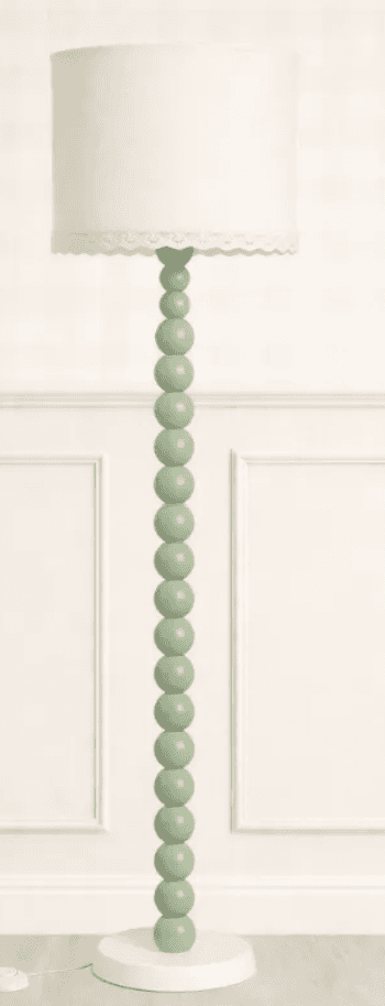A contemporary floor lamp featuring a distinctive light green beaded column stem, a stable round whi… — 3D model