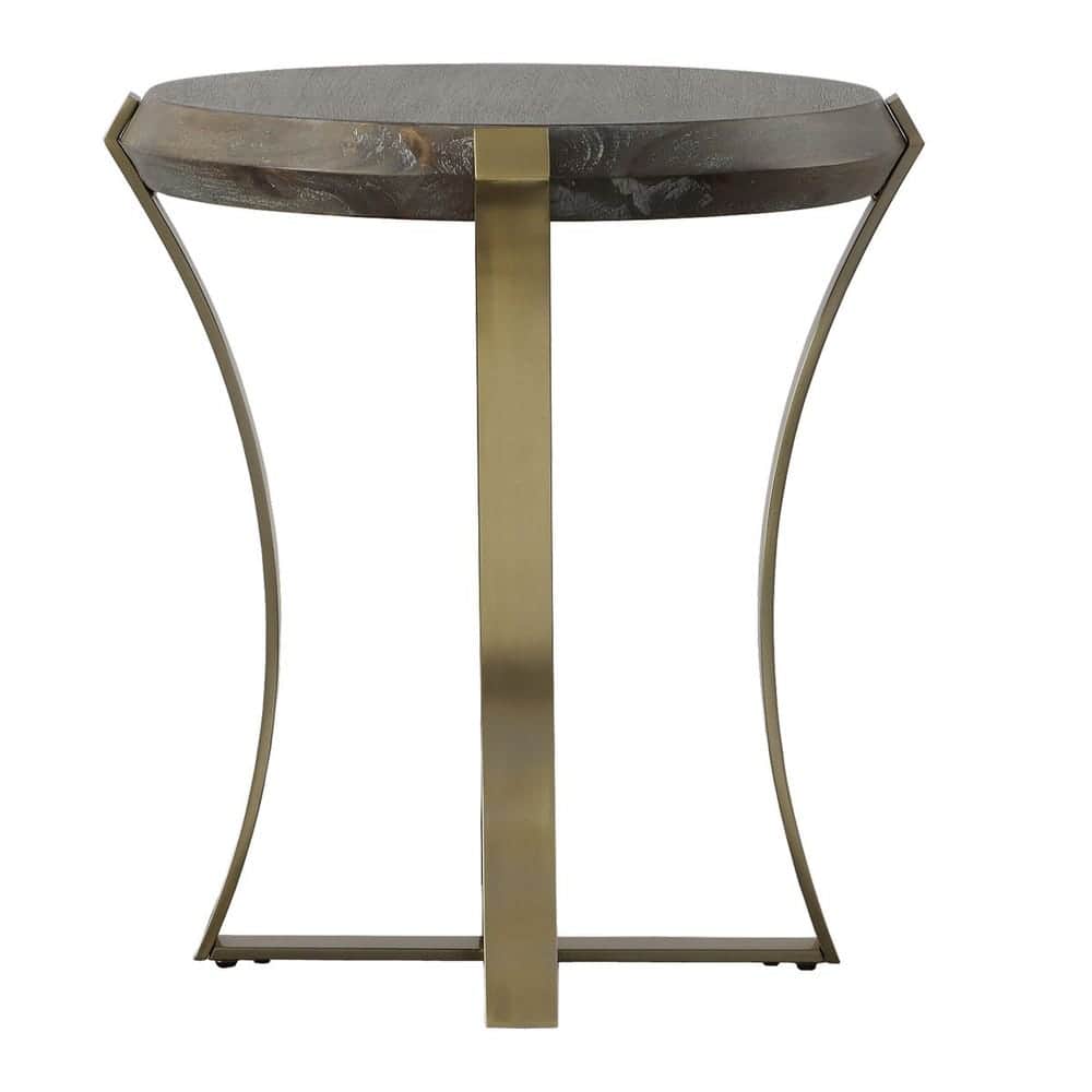 A round accent table featuring a distressed, textured wood top and a sculptural brass-toned metal ba… — 3D model