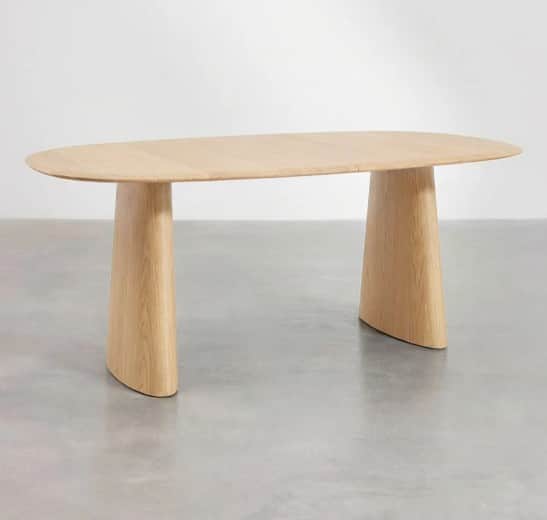 An organically shaped, light wood dining table with a smooth, matte finish. The tabletop is elongate… — free OBJ 3D model