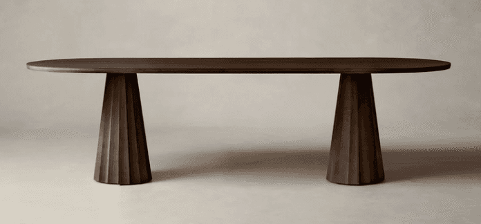 A contemporary dark wood oval dining table featuring a smooth tabletop supported by two sculptural,… — free BLEND 3D model
