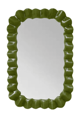 A decorative mirror with an oval-shaped reflective surface and a distinctively scalloped or ruffled… — 3D model