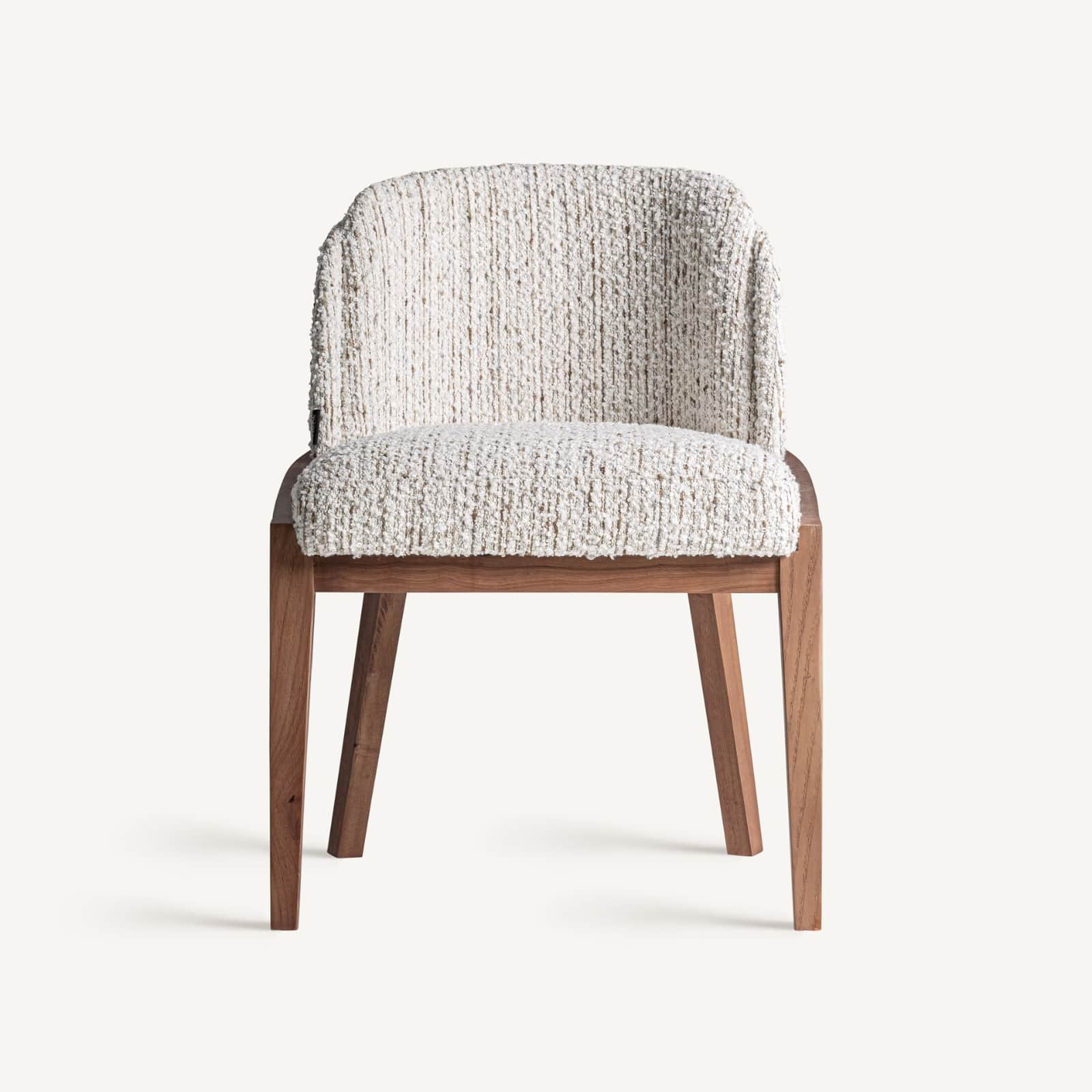 A contemporary upholstered armless dining chair featuring a solid wood frame and legs, and a fully u… — 3D model