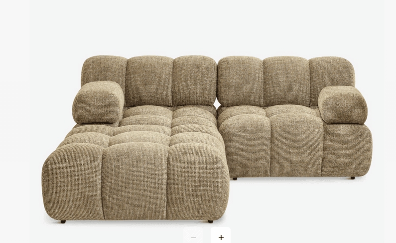 A modular sectional sofa with a low profile and rounded, tufted cushions. The sofa appears to be uph… — 3D model