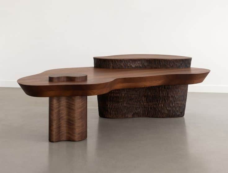 A sculptural, multi-tiered coffee table made from dark wood with an organic, irregular shape. — 3D model
