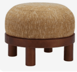 A small, round ottoman with a wooden base and four cylindrical legs. The upholstered top is covered… — 3D model