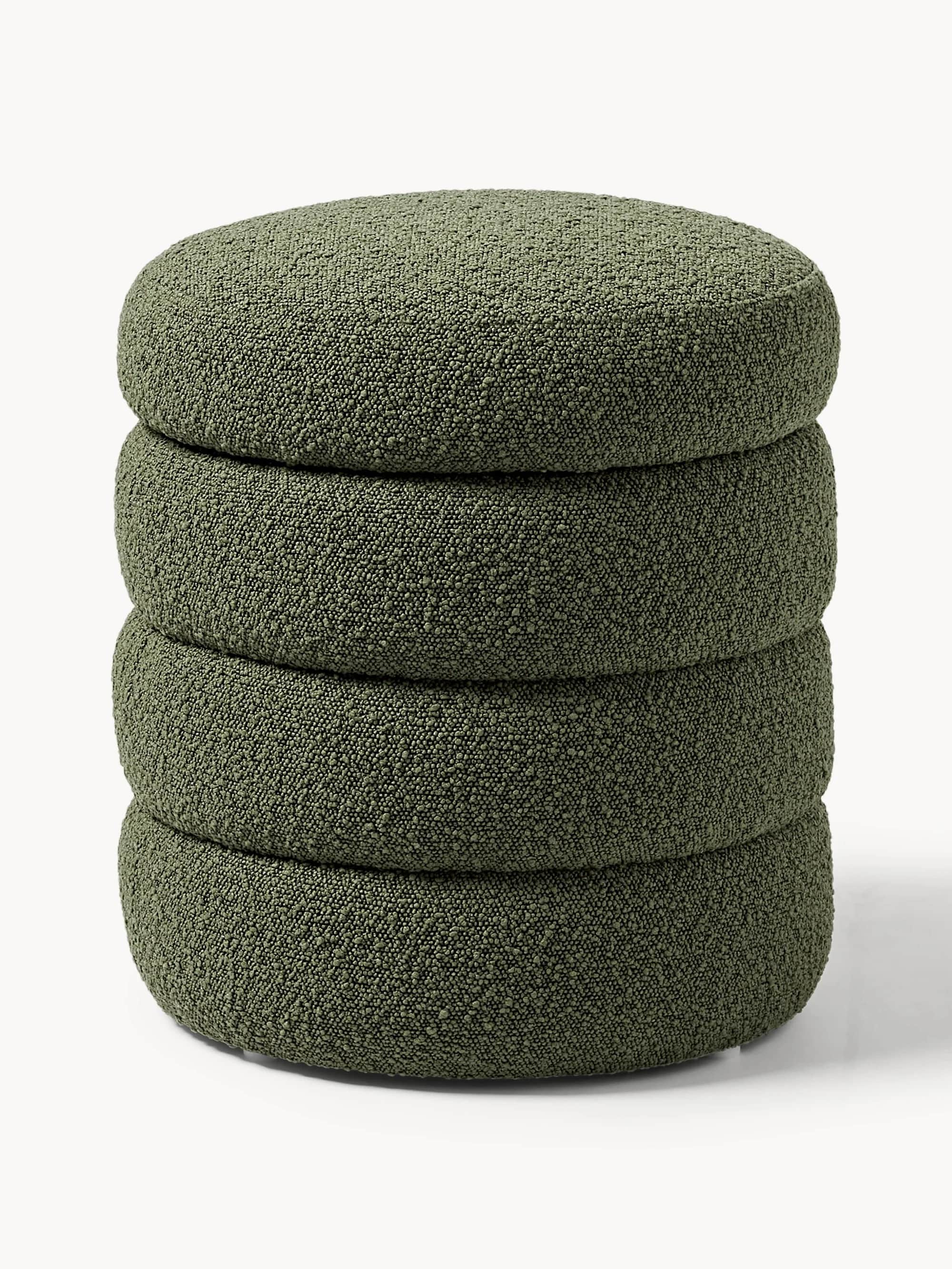Four round, olive-green upholstered poufs or floor cushions stacked vertically, featuring a distinct… — 3D model