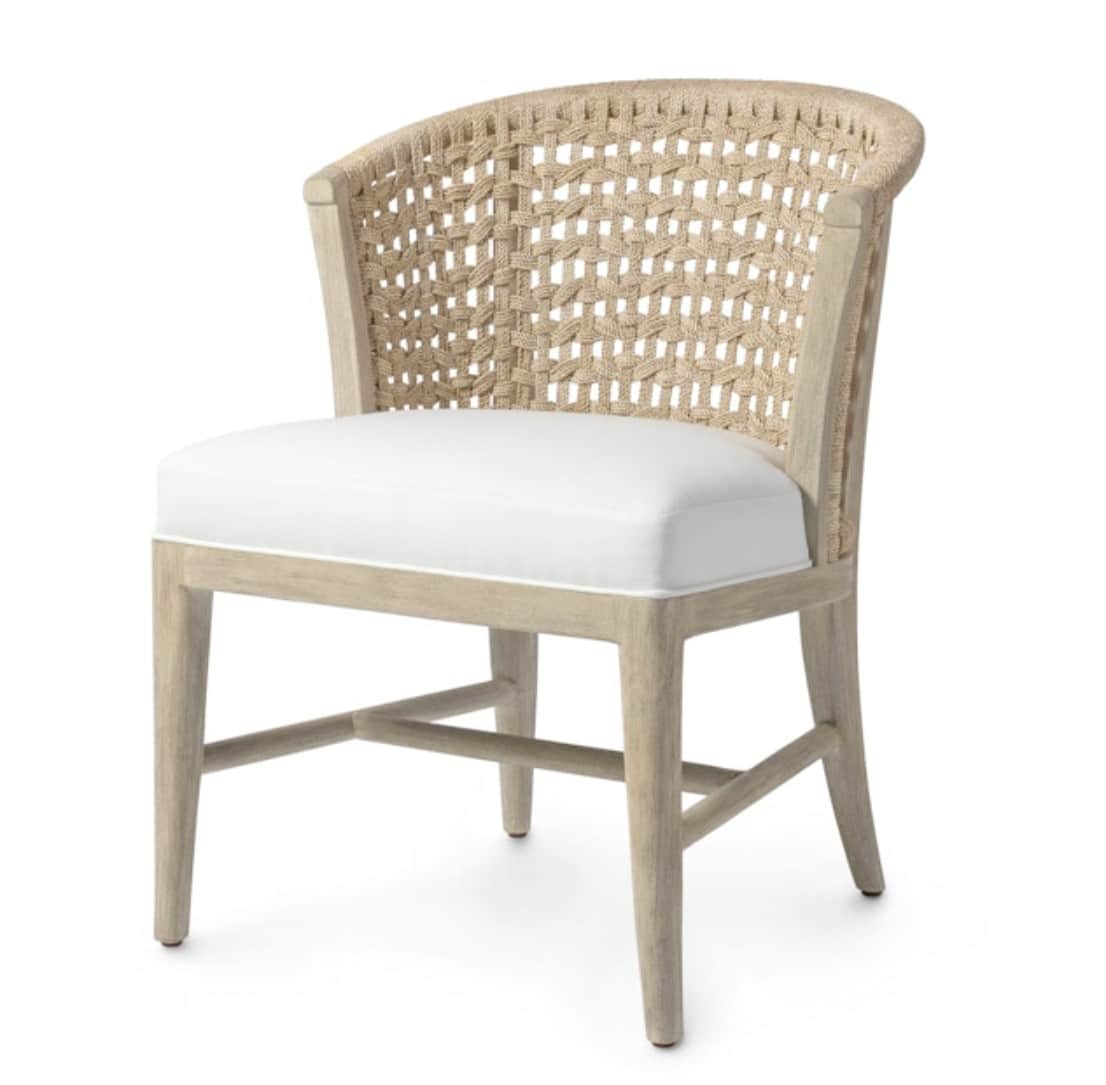 A light-toned wooden armchair with a woven backrest and a white upholstered seat. The backrest featu… — 3D model