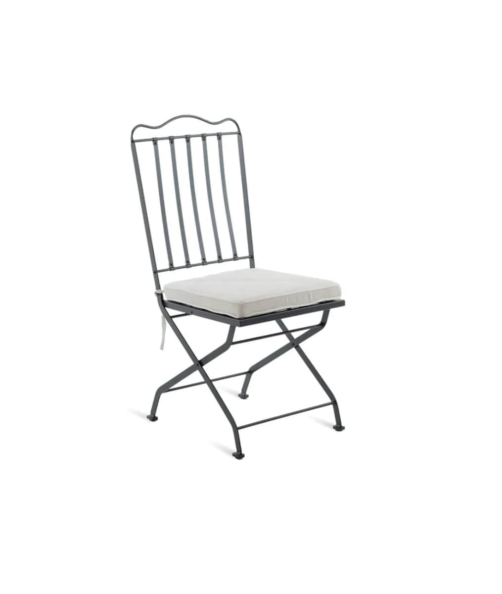 A dark metal folding chair with a cushioned seat and back. The chair has a slender, vertical slat de… — free GLTF 3D model