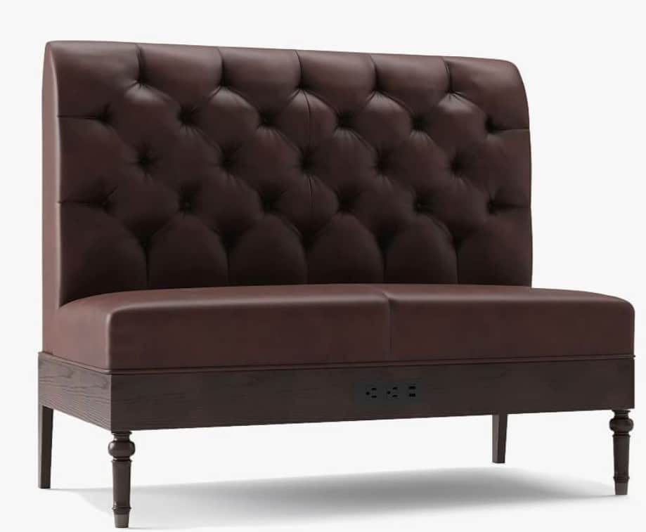 A two-seater booth with a high, tufted backrest and a wooden base. The upholstery appears to be leat… — 3D model