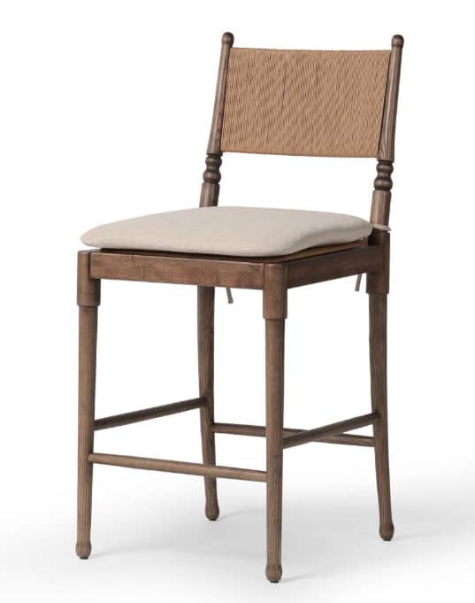 A wooden bar stool with a woven backrest and a cushioned seat. The stool features four legs connecte… — 3D model
