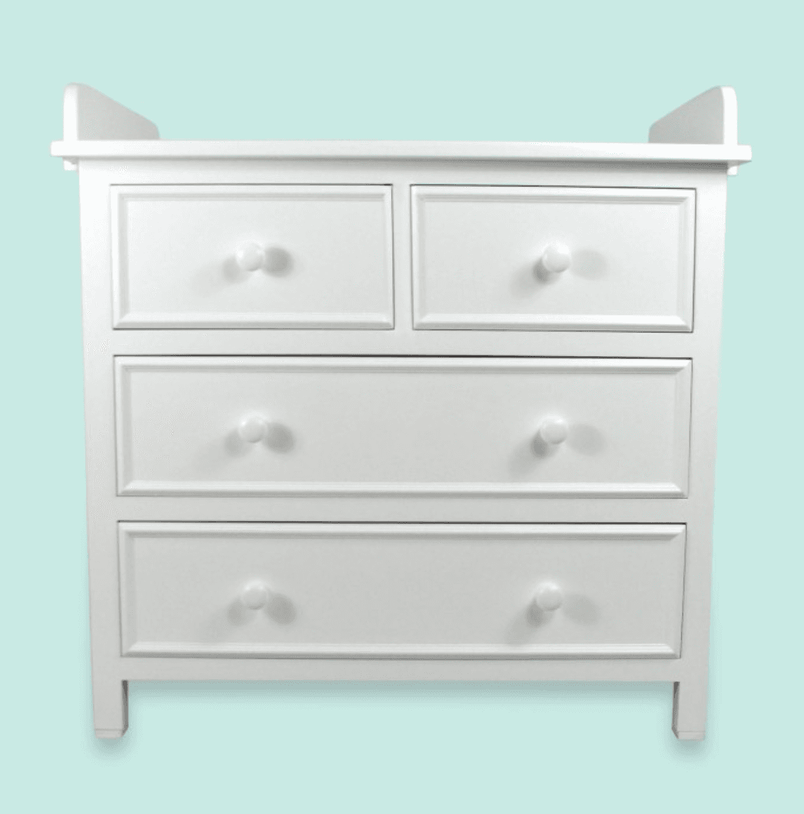A white dresser featuring a total of four drawers, with two smaller drawers positioned above two lar… — 3D model