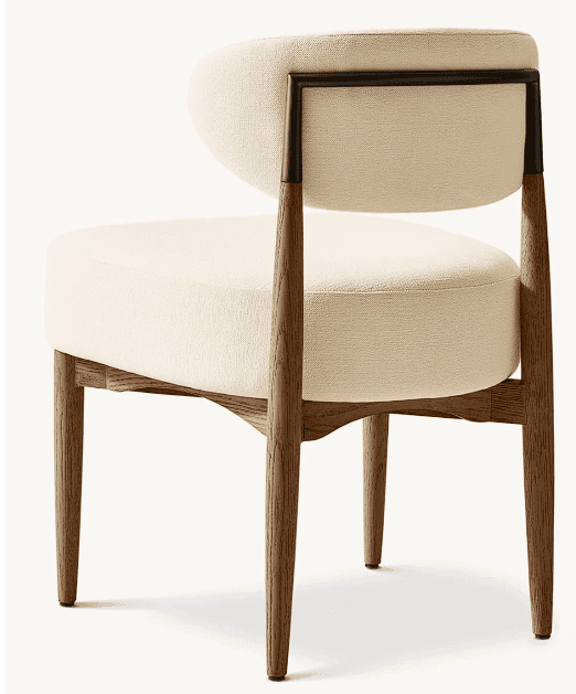 An armless chair featuring a curved, upholstered seat and backrest in a light-colored fabric, suppor… — 3D model
