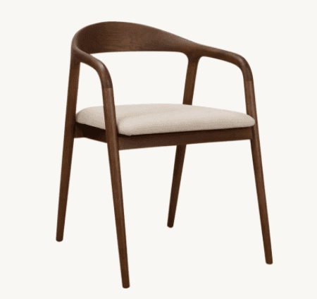 A modern armchair featuring a dark wood frame with a gracefully curved backrest and integrated armre… — 3D model