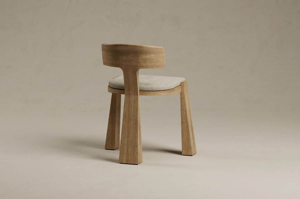 A modern wooden chair featuring a minimalist design. It has a light-colored wood frame with thick, a… — 3D model