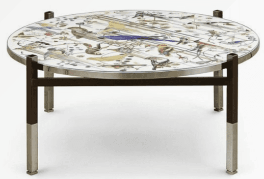 A round coffee table with a glass top featuring an intricate design of birds and foliage. The base i… — 3D model