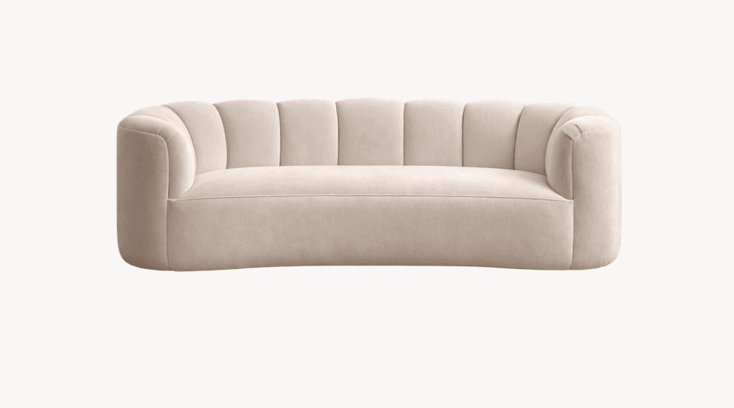 A cream-colored, upholstered sofa with a curved design and vertically channel-tufted backrest. The a… — 3D model