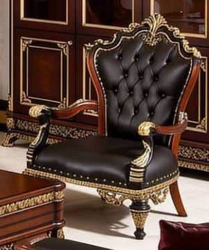An opulent Baroque-style armchair featuring a dark wood frame richly embellished with gilded carving… — 3D model