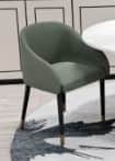 A modern upholstered armchair featuring a curved backrest and integrated armrests. The chair is upho… — 3D model