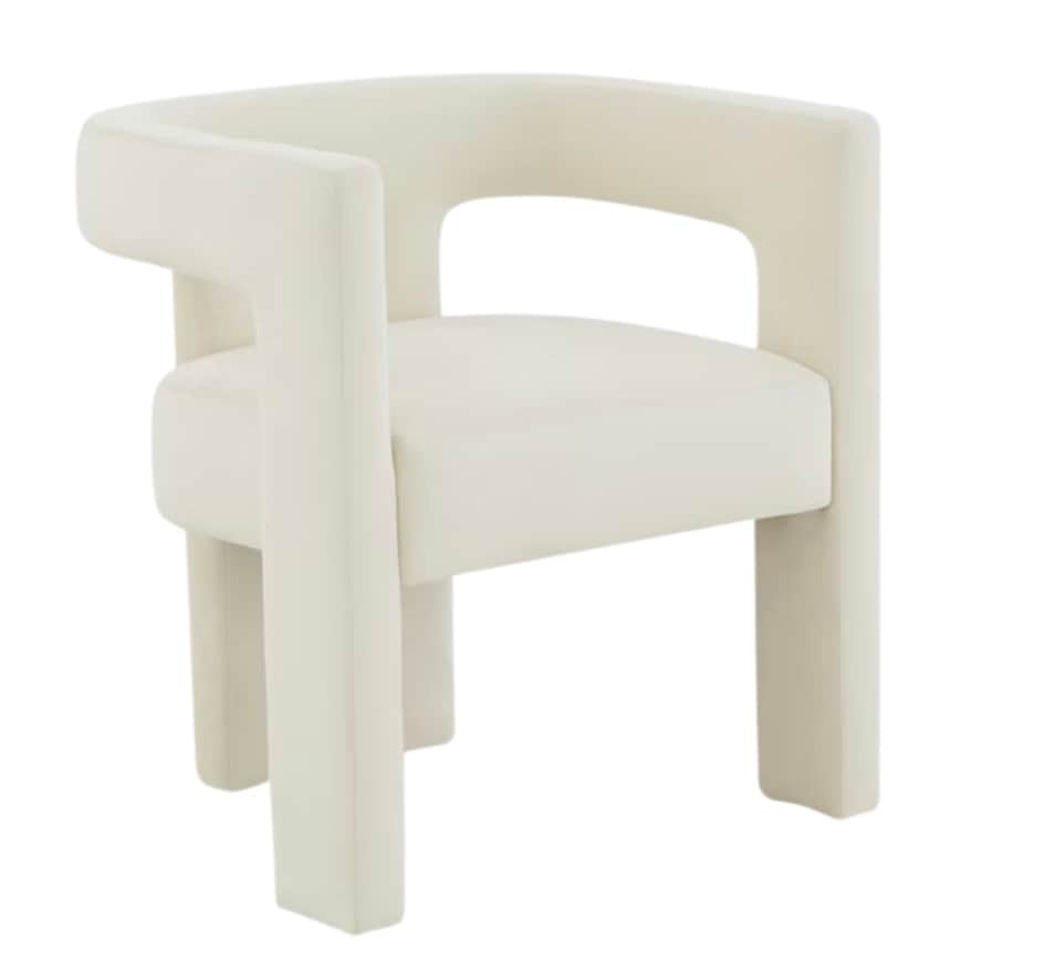A contemporary armchair with a sculptural, geometric design. The chair features a curved backrest th… — 3D model
