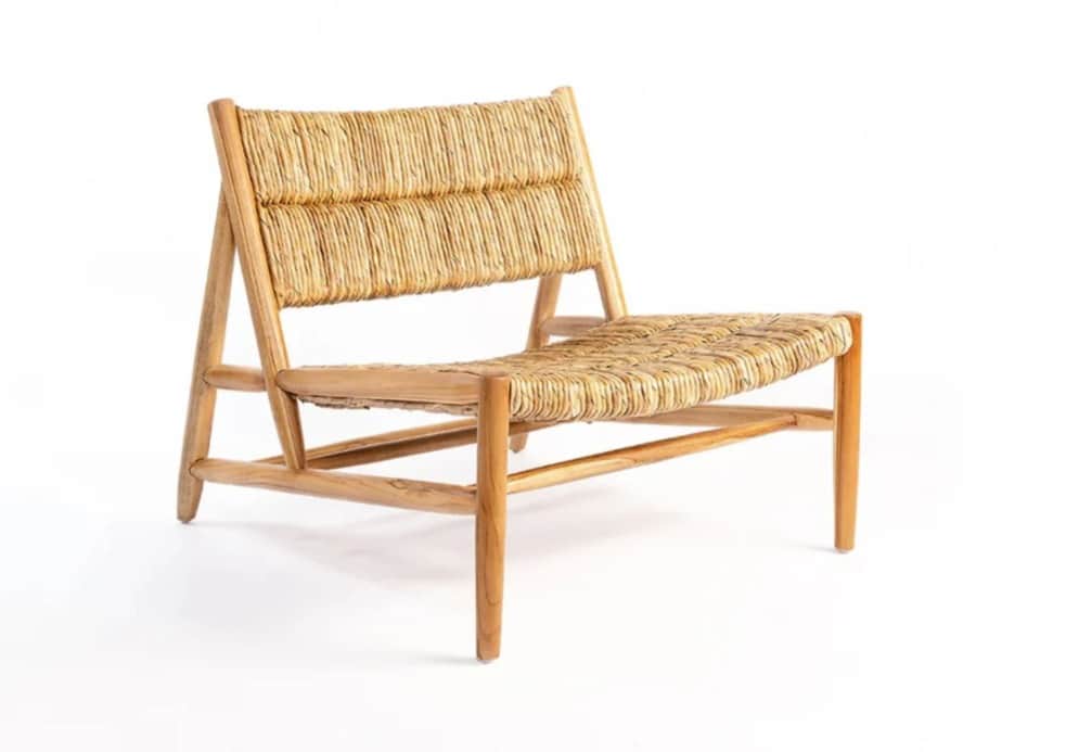A low-profile lounge chair featuring a natural wood frame and a tightly woven rush or seagrass seat… — free OBJ 3D model