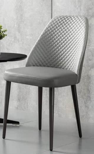 A modern, armless dining chair featuring a grey upholstered seat and a diamond-quilted backrest, sup… — free STL 3D model
