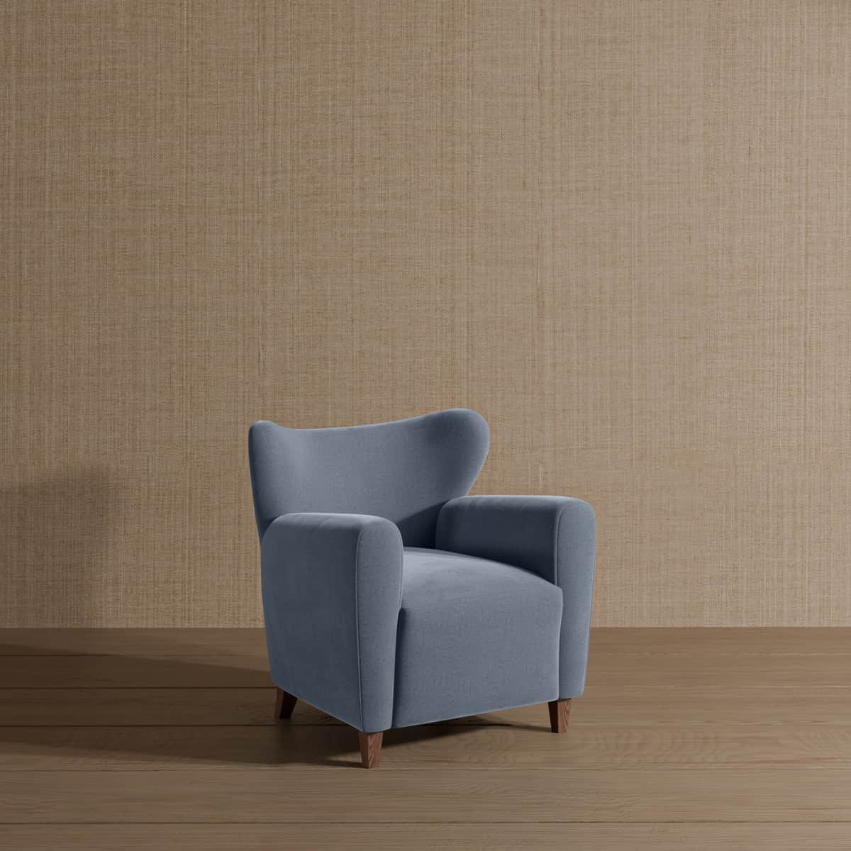 A single armchair with a high back and padded arms, upholstered in a soft blue fabric. It has four s… — 3D model