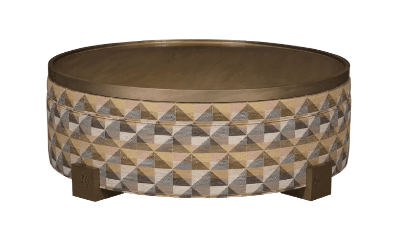 A round, upholstered ottoman featuring a geometric triangular pattern in various muted colors. It is… — 3D model