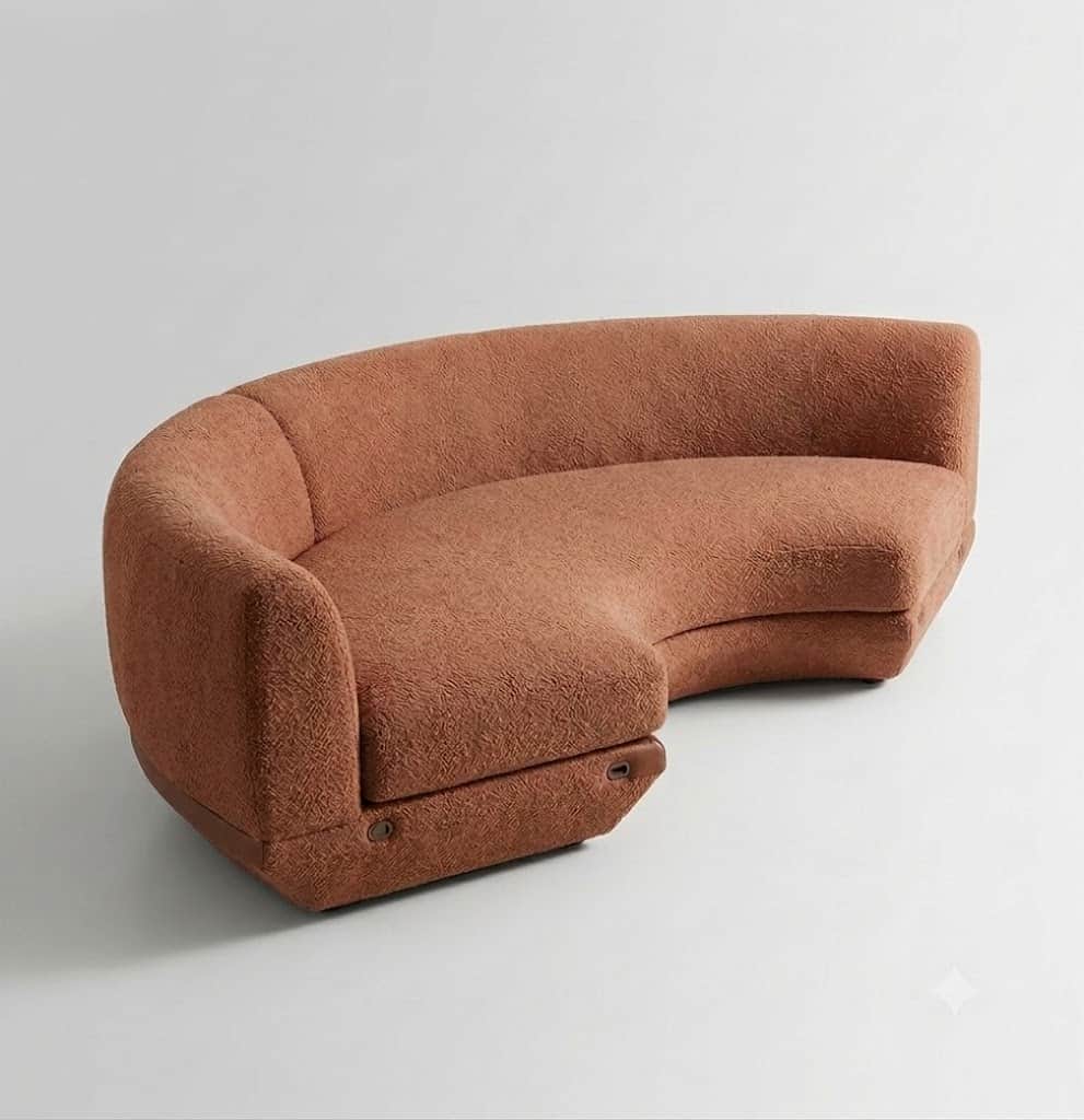 A contemporary curved sectional sofa, upholstered in a warm terracotta or rust-colored boucle fabric… — 3D model