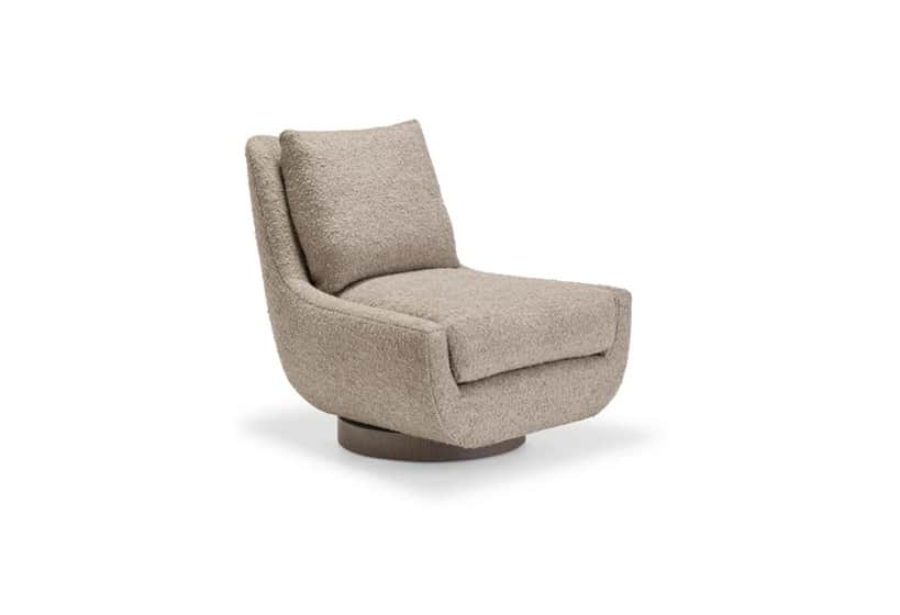 A modern armchair with a curved silhouette and a swivel base. It features a plush, textured upholste… — 3D model