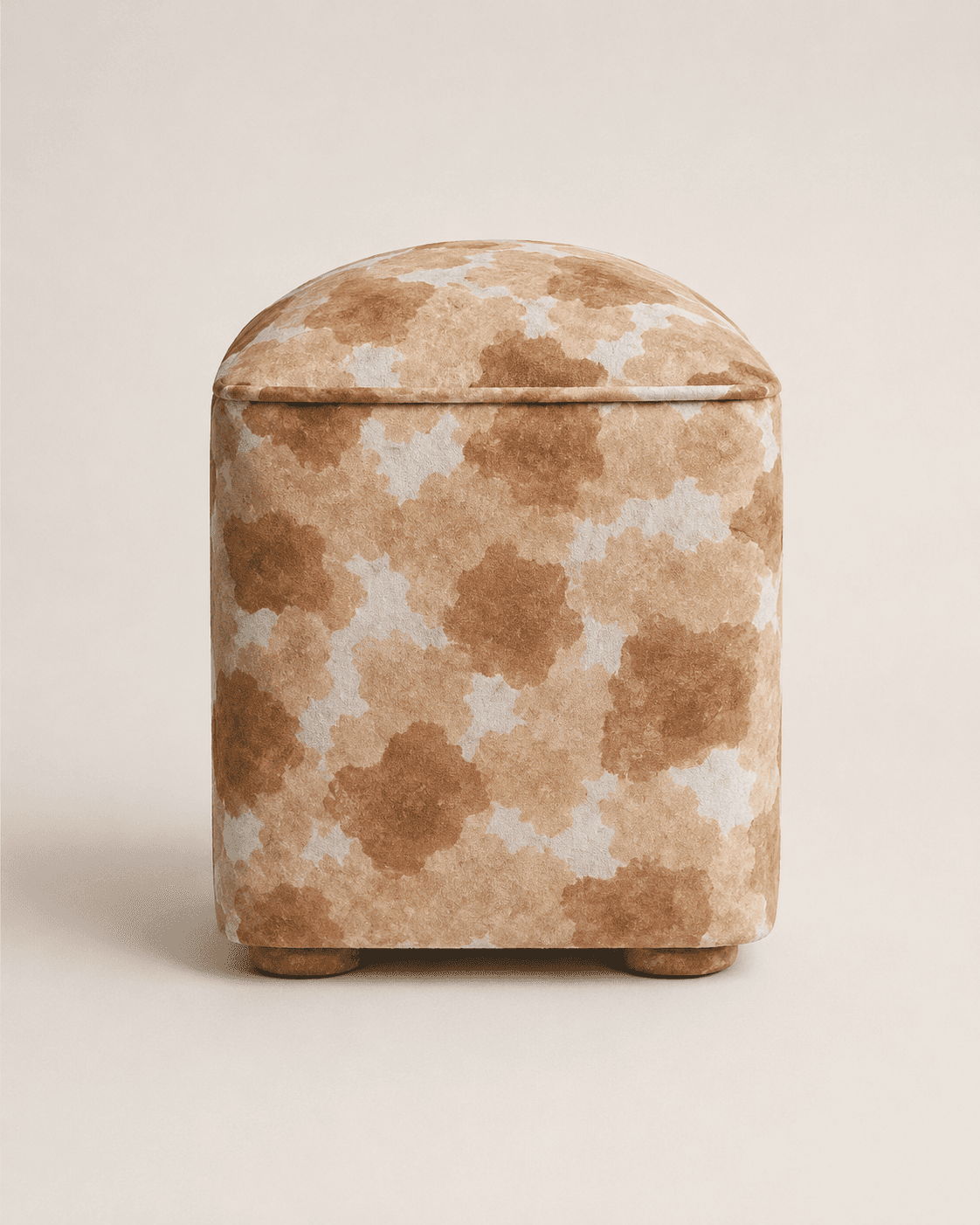 A square-shaped upholstered ottoman with a slightly domed top cushion and four low, round feet. The… — 3D model