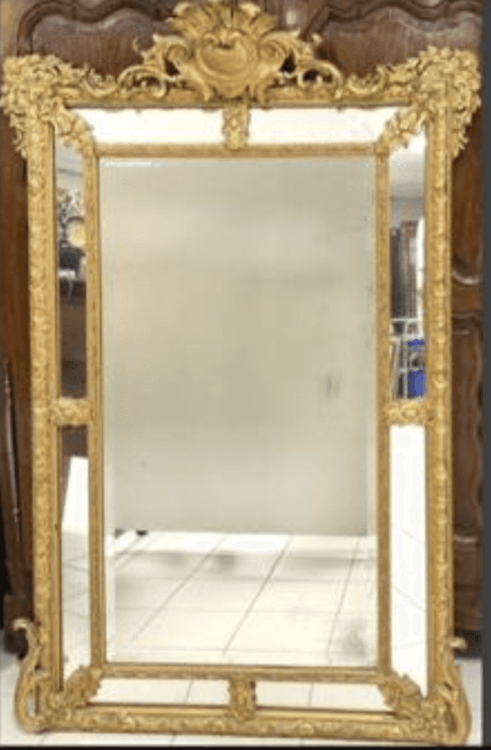 A rectangular mirror with an ornate, gilded frame. The frame features intricate carvings and decorat… — 3D model
