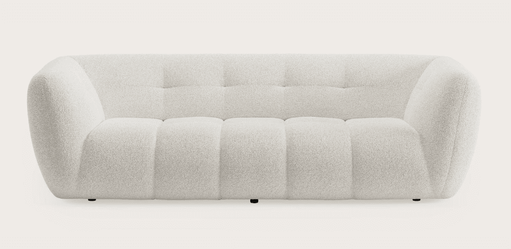 A contemporary three-seater sofa upholstered in an off-white bouclé fabric. The design features a lo… — free SKP 3D model