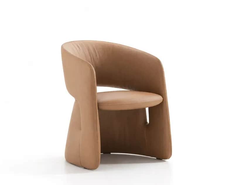 A contemporary armchair featuring a distinctive sculptural form, fully upholstered in tan leather. T… — 3D model