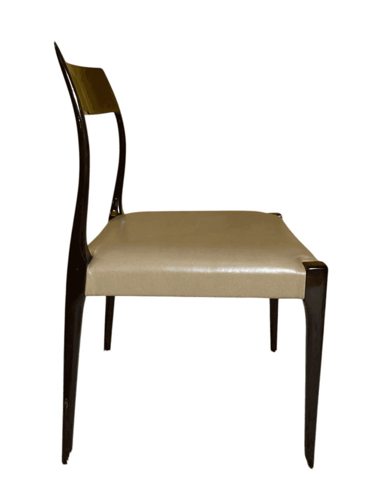 A minimalist chair featuring a dark, possibly rosewood or mahogany, curved frame and slender, tapere… — 3D model