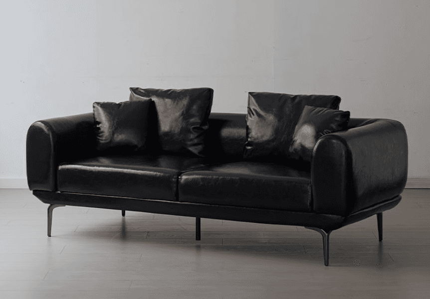 A contemporary two-seater loveseat upholstered in black faux leather, featuring rounded armrests and… — free GLTF 3D model