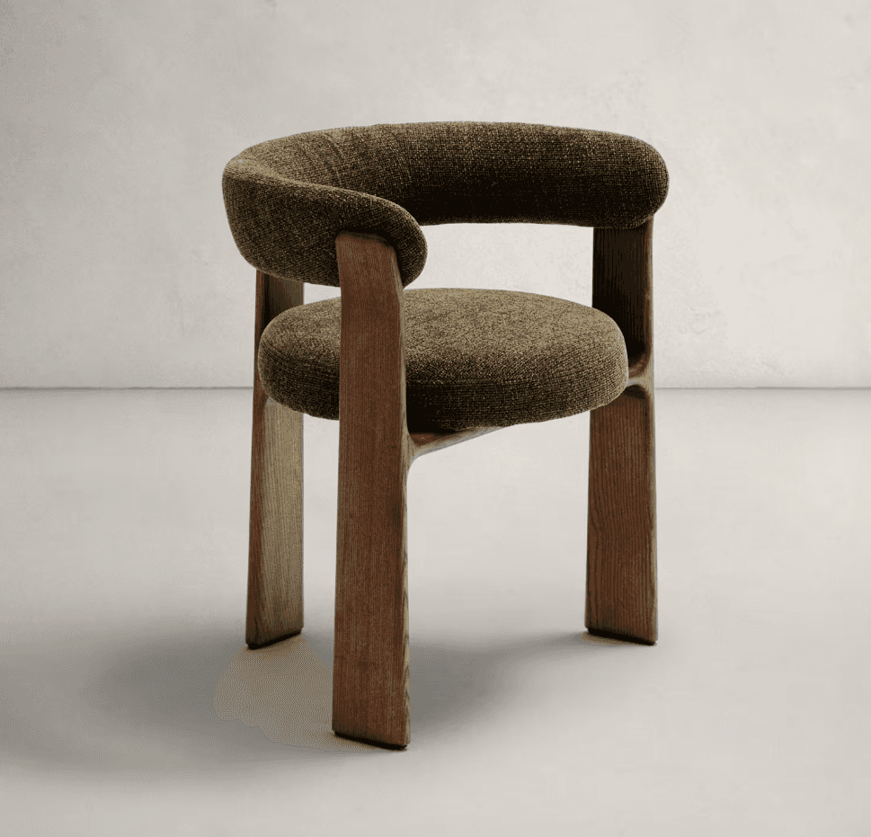 An armchair with a rounded, upholstered backrest and seat, supported by a solid wooden frame. The wo… — free OBJ 3D model