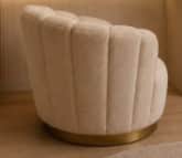 An upholstered accent chair with a distinctive fluted or channel-tufted backrest and rounded arms, f… — 3D model