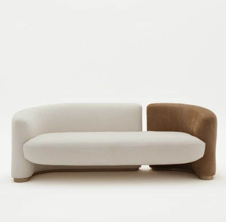An asymmetrical two-seater upholstered loveseat featuring a dual-material and dual-color design. One… — 3D model