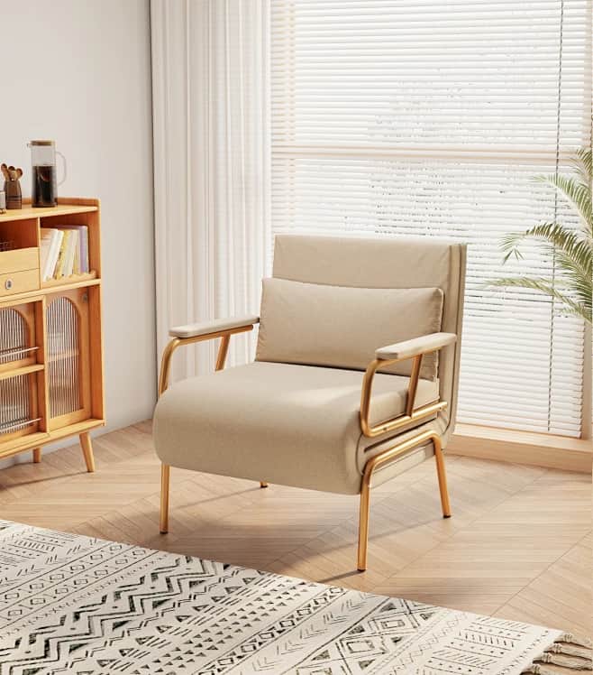A modern armchair featuring a beige upholstered body, gold-colored tubular metal frame, and a matchi… — free OBJ 3D model