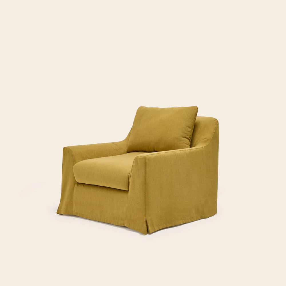 An upholstered armchair featuring a deep mustard yellow fabric. The chair includes a separate seat c… — 3D model