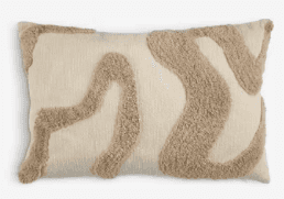 A rectangular cushion with a textured pattern. The base fabric is a light cream color, and it featur… — 3D model
