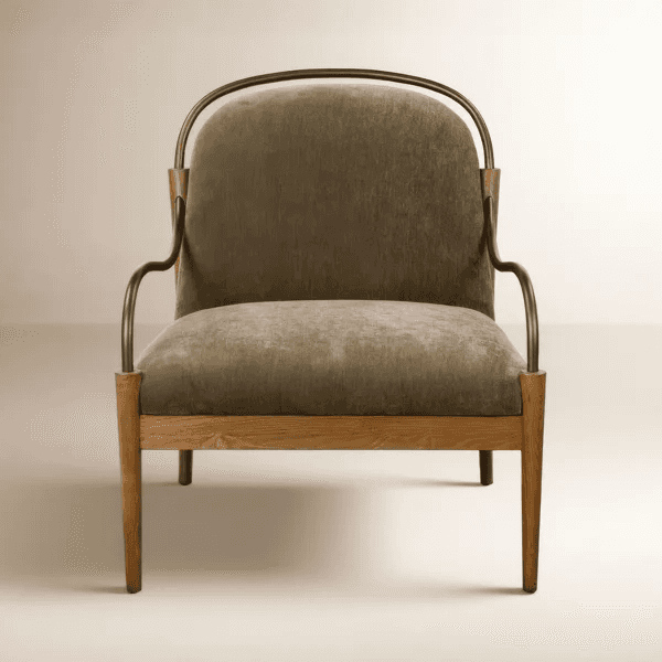 A contemporary upholstered accent armchair featuring a light oak wooden frame and distinctive curved… — 3D model