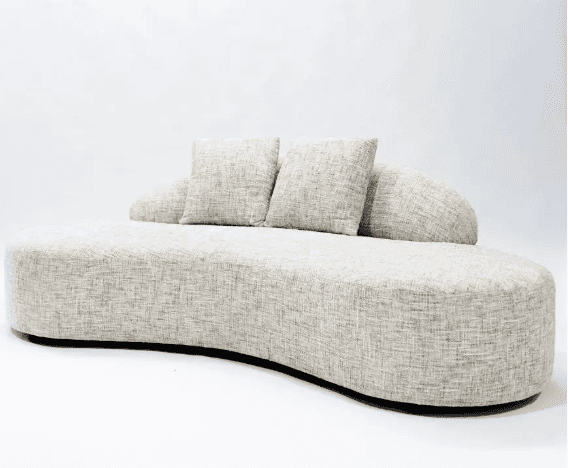 A modern, upholstered sofa with a distinctive curved silhouette. It features a low profile and a flo… — free GLTF 3D model